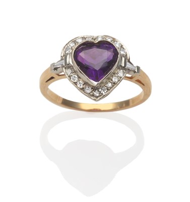 Lot 2195 - An Amethyst and Diamond Heart Shaped Cluster Ring, a heart cut amethyst in a white rubbed over...