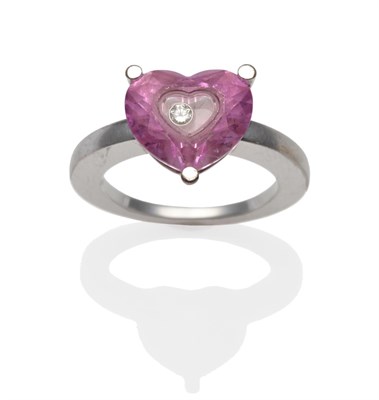 Lot 2196 - A 'So Happy' Ring, by Chopard, a heart shaped pink paste stone in a white claw setting containing a