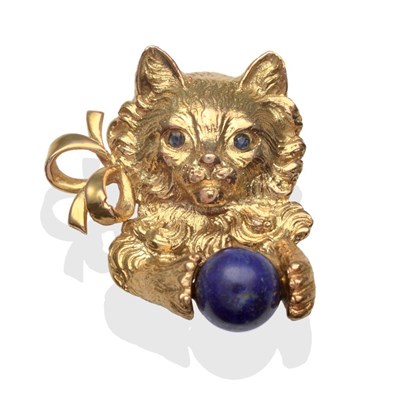 Lot 2214 - A Lapis Lazuli and Sapphire Cat Brooch, realistically modelled  clutching a lapis lazuli...