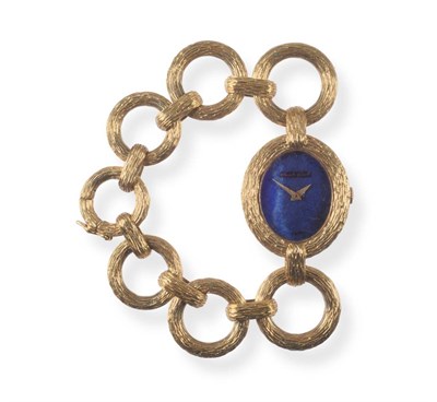 Lot 2230 - A Lady's 18ct Gold Wristwatch, signed Bueche Girod, 1972, lever movement signed, faux lapis...