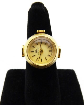 Lot 2268 - An 18ct Gold Ring Watch, retailed by Bucherer, circa 1970, lever movement, champagne coloured...