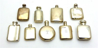 Lot 2273 - A Collection of Eight Small Silver Hip Flasks, various dates and makers, each with a screw off...