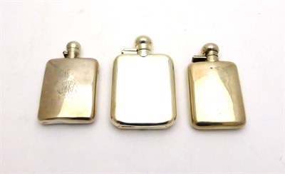 Lot 2274 - Three Silver Hip Flasks, each rounded rectangular with a bayonet action hinged cover,...