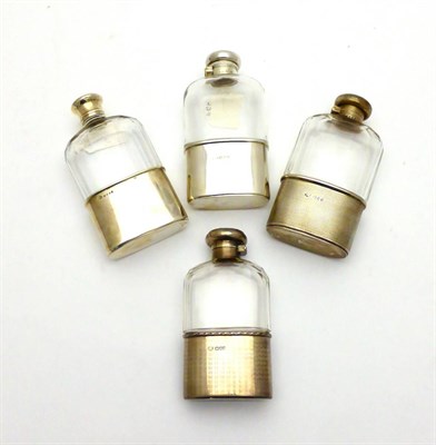 Lot 2278 - Four Victorian and Later Silver Mounted Cut Glass Hip Flasks, each with facet cut shoulder and...