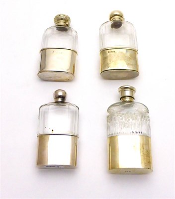 Lot 2279 - Four Silver Mounted Cut Glass Hip Flasks, various dates and makers, comprising: two with facet...