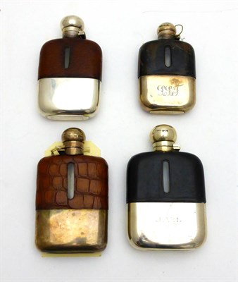 Lot 2280 - Four Victorian and Later Silver Mounted Leather Covered Hip Flasks, various dates and makers,...