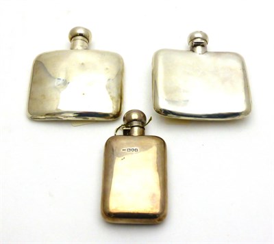 Lot 2281 - Three Silver Hip Flasks, various makes and dates, each rounded rectangular with a bayonet...