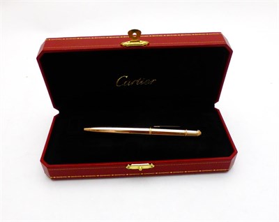 Lot 2321 - Cartier: A Mini Diabolo de Cartier Ballpoint Pen, model: 106232, in original presentation case,...