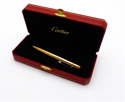 Lot 2323 - Cartier: A Mini Diabolo de Cartier Ballpoint Pen, model: 106232, in original presentation case,...