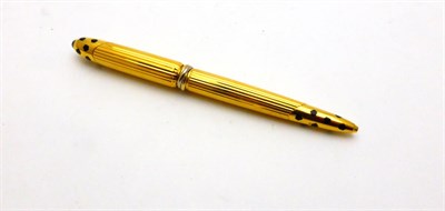 Lot 2324 - Cartier: A Panthere de Cartier Ballpoint Pen, circa 1990,  gold plated with black enamel