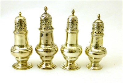 Lot 2338 - A Matched Set of Four Silver Pepperettes, various makers, London 1763, 1764, 1766 and 1784, each of