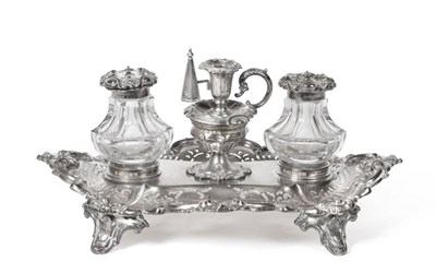 Lot 2354 - A Victorian Silver Inkstand, Henry Wilkinson & Co, Sheffield 1875, oval with a shaped C scroll...