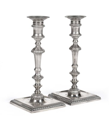 Lot 2366 - A Pair of Edwardian Cast Silver Candlesticks, Alstons & Hallam, London 1907, in the early 18th...