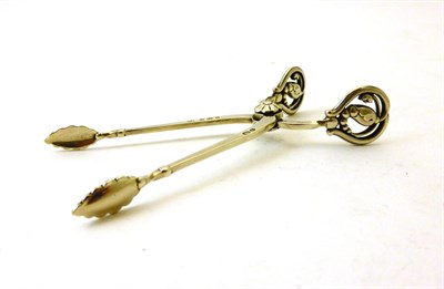 Lot 2400 - Georg Jensen: A Pair of Silver Blossom Pattern Sugar Tongs, import marks for 1928, 10.5cm long,...