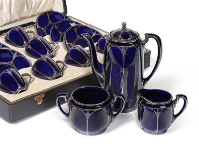 Lot 2405 - An American Lenox Porcelain Silver Overlaid Coffee Service, comprising a cased set of six...