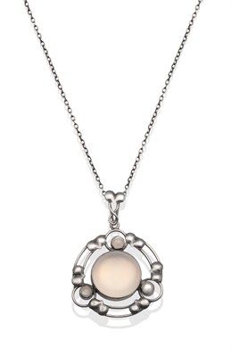 Lot 2004 - An Arts & Crafts Moonstone Pendant, a round cabochon moonstone in a white rubbed over setting...