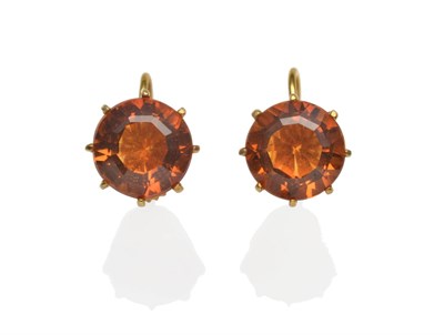 Lot 2009 - A Pair of Citrine Solitaire Earrings, a round cut citrine in a yellow claw setting with a...