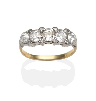 Lot 2032 - A Diamond Ring, five old cut diamonds spaced by eight-cut diamond accents in white rubbed over...