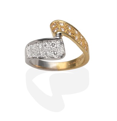 Lot 2051 - An 18 Carat Two Colour Gold Diamond Ring, the scroll top pavé set with round brilliant cut...