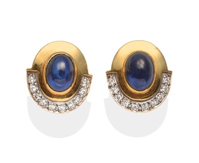 Lot 2056 - A Pair of Sapphire and Diamond Earrings, oval cabochon sapphires in yellow rubbed over settings, to