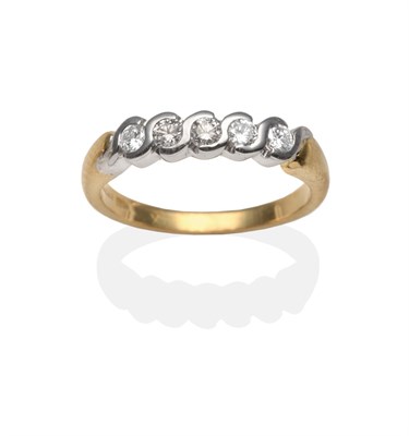 Lot 2058 - A Diamond Five Stone Ring, round brilliant cut diamonds in white rubbed over scroll settings,...