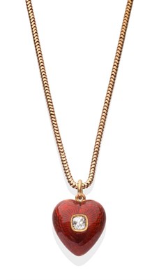 Lot 2065 - A Red Enamel Diamond Set Heart Pendant, an old cut diamond in a yellow star setting to a red...