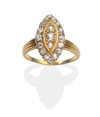 Lot 2069 - A Diamond Navette Ring, set throughout with old cut diamonds in yellow claw settings, to reeded...