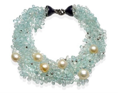 Lot 2078 - An Aquamarine and South Sea Cultured Pearl Torsade Necklace, multiple rows of faceted pear...