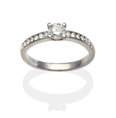 Lot 2083 - An 18 Carat White Gold Diamond Solitaire Ring, a round brilliant cut diamond in a four claw...