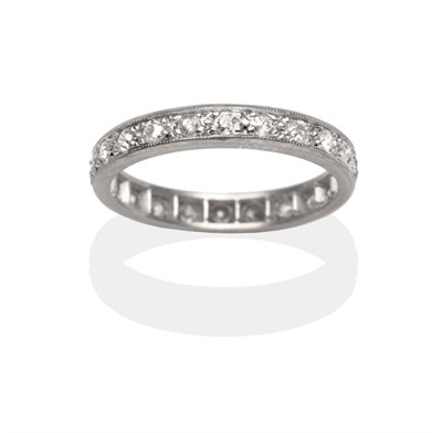 Lot 2109 - A Diamond Eternity Ring, old cut diamonds in white claw and milgrain settings, total estimated...