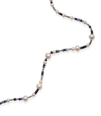 Lot 2111 - A Cultured Pearl, Sapphire and Rough Diamond Bead Necklace, graduated cultured pearls spaced by...