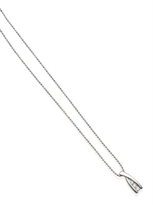 Lot 2131 - An 18 Carat White Gold Diamond Wishbone Pendant, three graduated round brilliant cut diamonds...