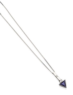 Lot 2132 - A 9 Carat White Gold Iolite and Diamond Pendant, a round brilliant cut diamond inset bar suspends a