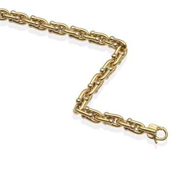 Lot 2141 - An 18 Carat Gold Bracelet, by Chimento, formed of curved barbell links, length 18cm, cased see...