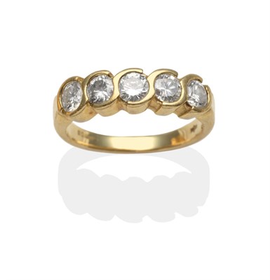 Lot 2147 - An 18 Carat Gold Diamond Five Stone Ring, round brilliant cut diamonds in half rubbed over...