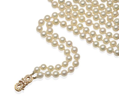 Lot 2159 - A Double Strand Cultured Pearl Necklace with a Diamond Set Clasp, two rows of 110:103 uniform...