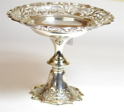 Lot 2226 - An Edwardian Silver Pedestal Dish, Walker & Hall, Sheffield 1908, of circular form pierced with...