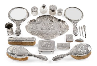 Lot 2232 - A Composite Silver Dressing Table Set, various dates and manufacturers, 20th century, embossed with