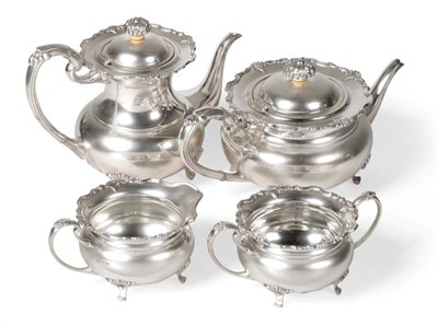 Lot 2254 - An Elizabeth II Silver Four Piece Tea and Coffee Service, Sheffield 1972, of baluster form with...