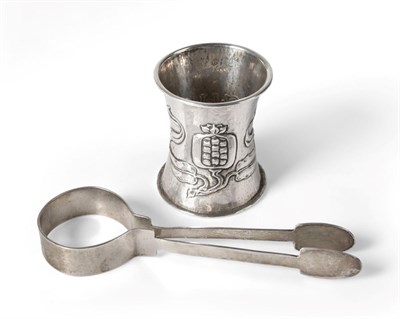 Lot 2282 - A Pair of Liberty & Co Silver Sugar Tongs, maker's mark L&Co, Birmingham 1906, hammered finish,...