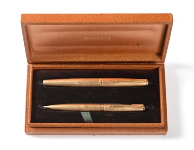 Lot 2301 - A 9ct Gold Cased Parker 61 Fountain Pen, London 1968, with 14K nib, inscribed on an engine...