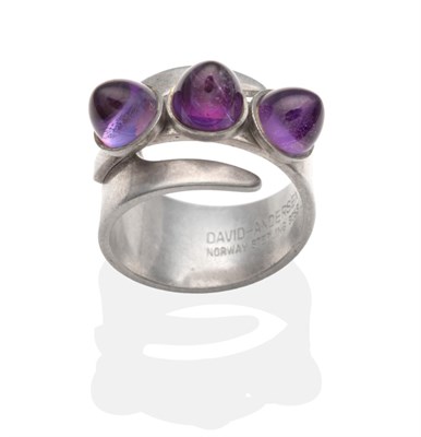 Lot 2004 - An Amethyst Ring, by David Andersen, three high domed cabochon amethyst in rubbed over settings...