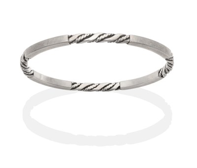 Lot 2008 - A Silver Georg Jensen Bangle, model number 17C, of twisted and plain bar design, measures 6cm...