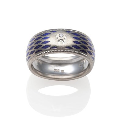 Lot 2021 - A Diamond and Blue Enamel Band Ring, by Wellendorff, inset with a round brilliant cut diamond above