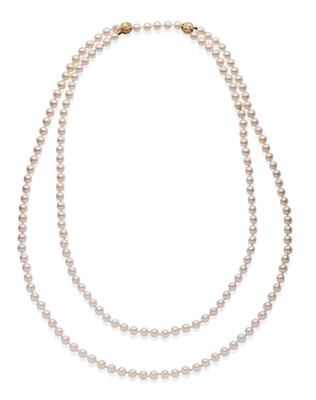 Lot 2060 - A Cultured Pearl Necklace, by Mikimoto, a strand of uniform cultured pearls knotted each end...