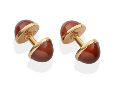 Lot 2066 - A Pair of Carnelian Solid Bar Cufflinks, round cabochon carnelian in rubbed over settings,...