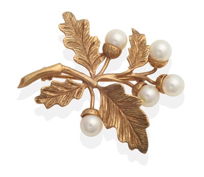 Lot 2067 - A 9 Carat Gold Cultured Pearl Acorn Spray Brooch, cultured pearl set acorns to textured leaves,...