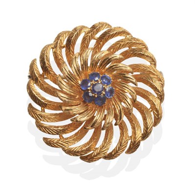 Lot 2068 - An 18 Carat Gold Sapphire Brooch, a cluster of seven round cut sapphires in claw settings...