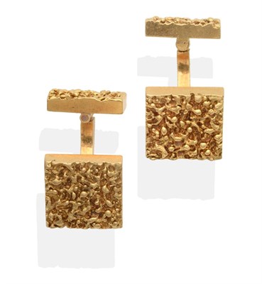 Lot 2079 - A Pair of 18 Carat Gold Textured Cufflinks, a square head connected to a textured rectangular...