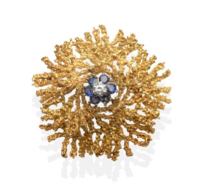 Lot 2080 - An 18 Carat Gold Diamond and Sapphire Brooch, a round brilliant cut diamond within a cluster of...